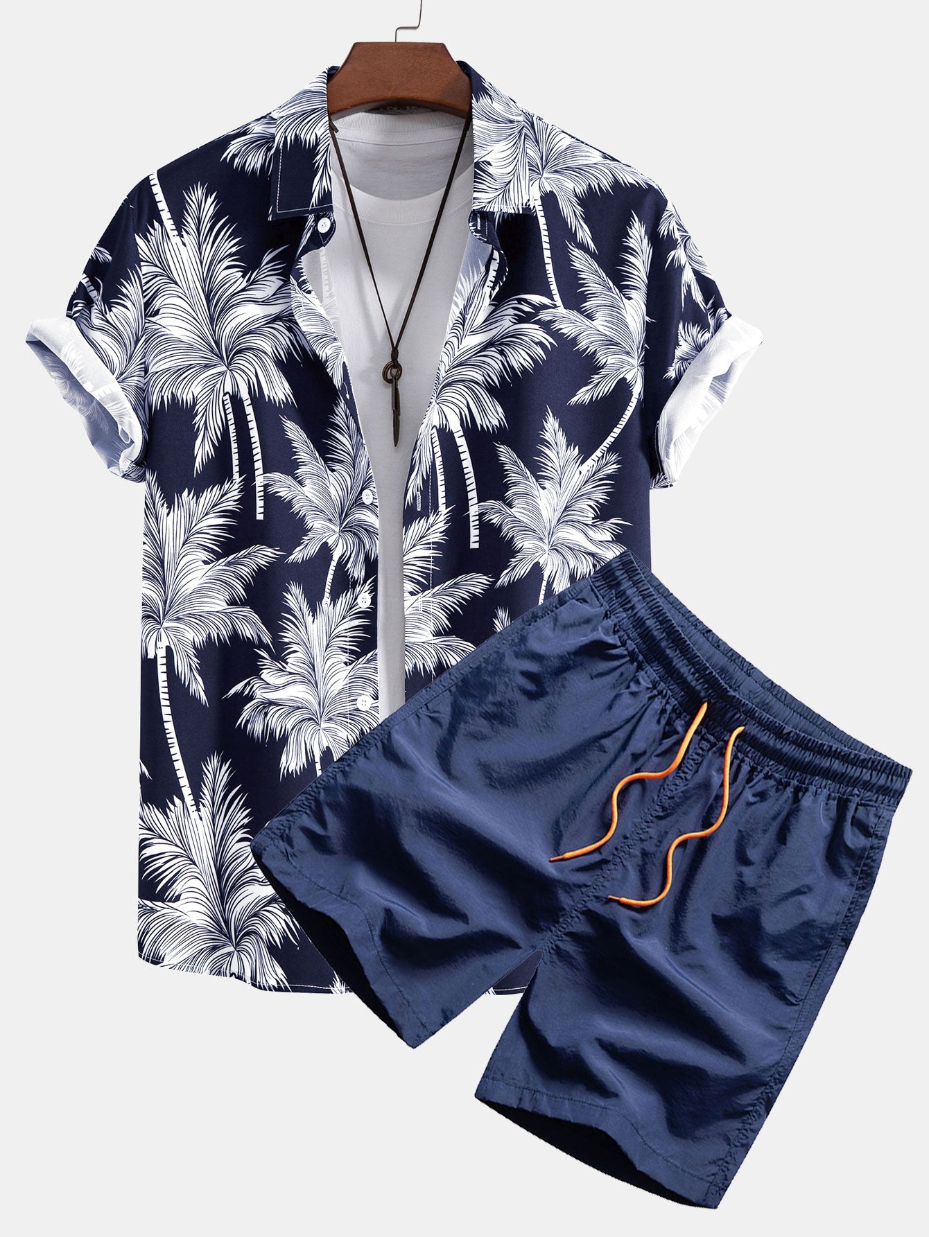 Camisa abotonada con estampado de palmeras y bañador corto