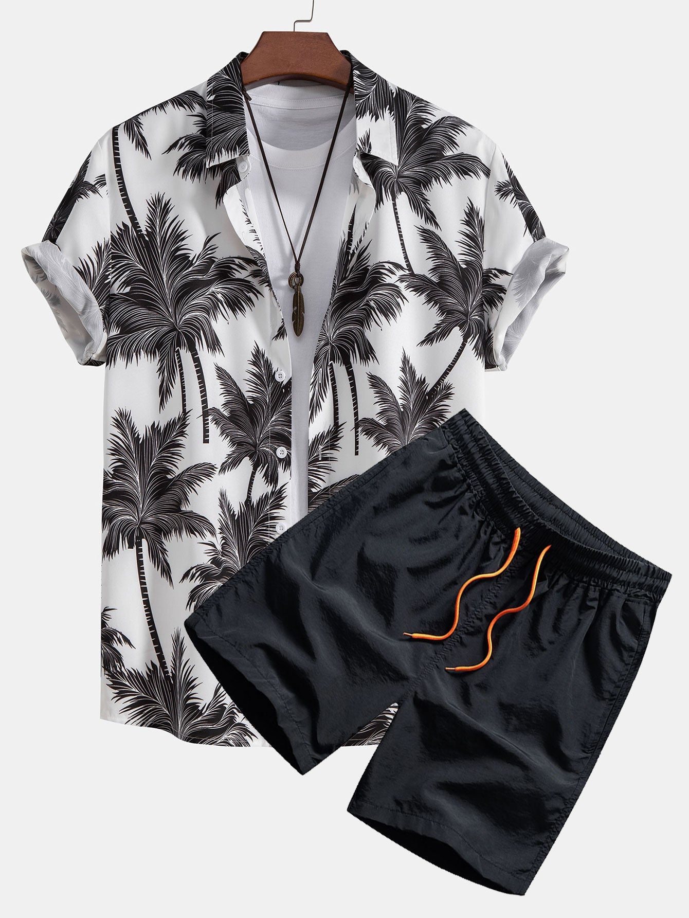 Camisa abotonada con estampado de palmeras y bañador corto