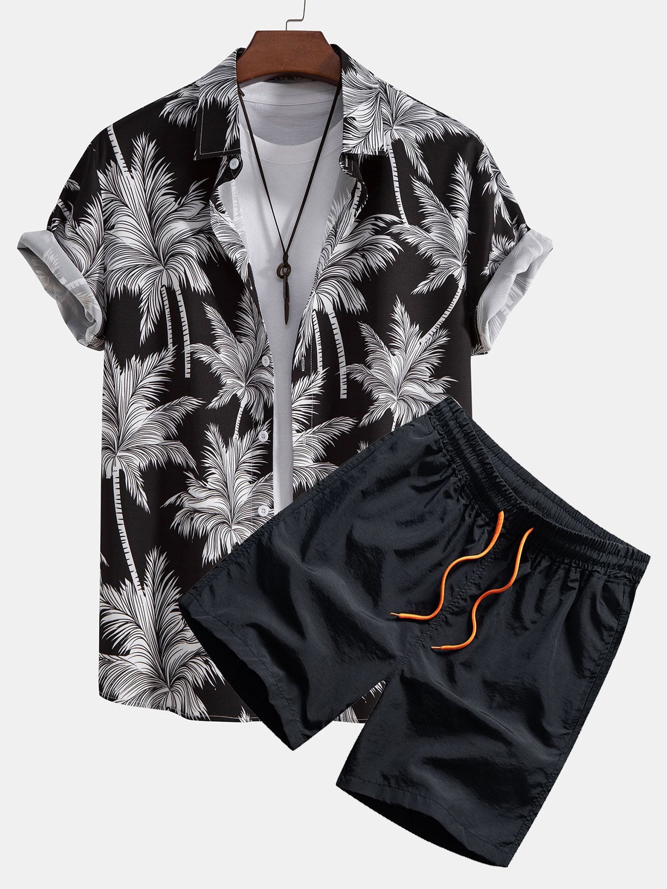 Camisa abotonada con estampado de palmeras y bañador corto