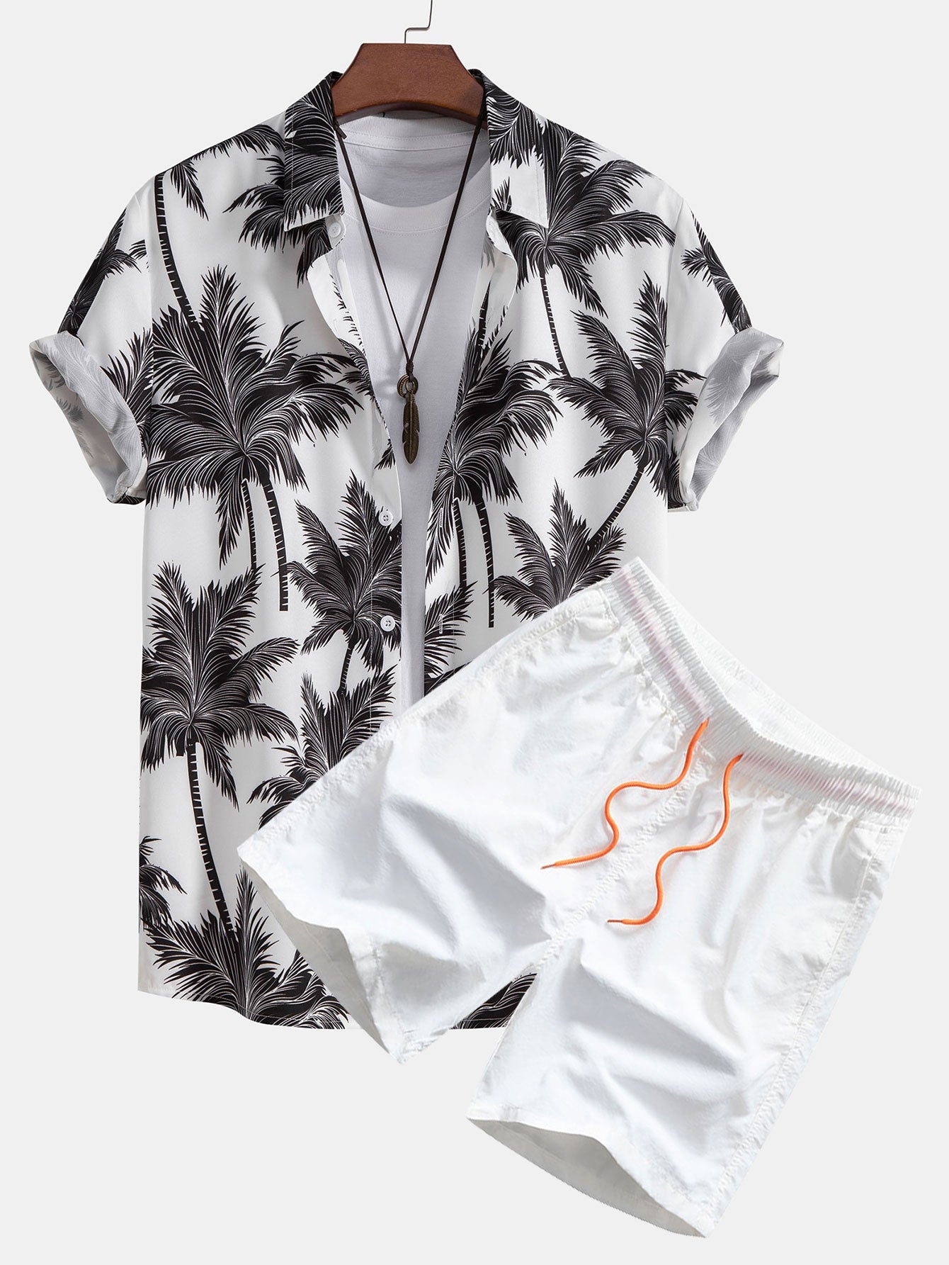 Camisa abotonada con estampado de palmeras y bañador corto