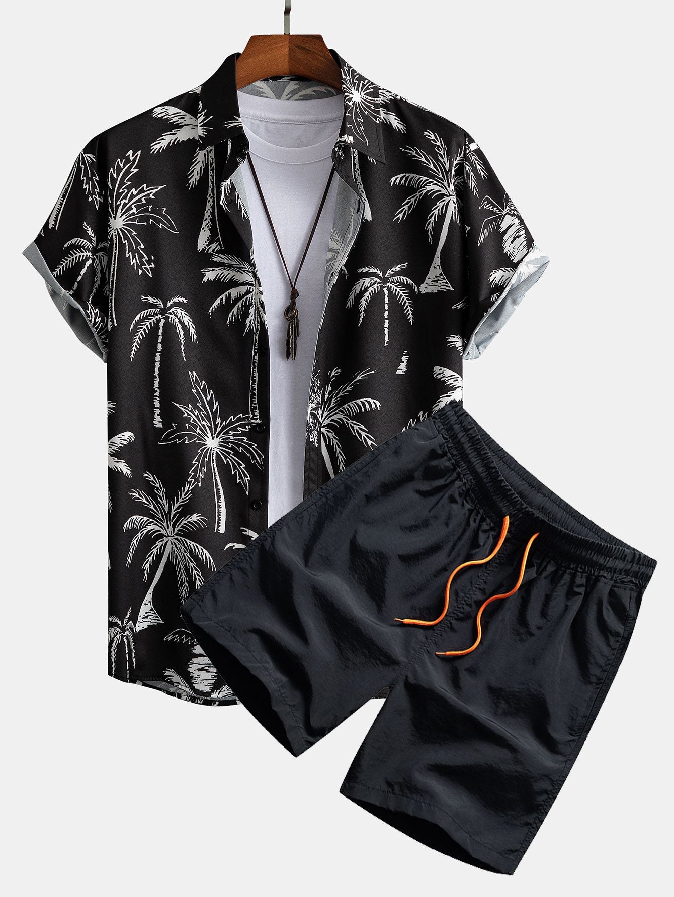 Camisa abotonada con estampado de palmeras y bañador corto