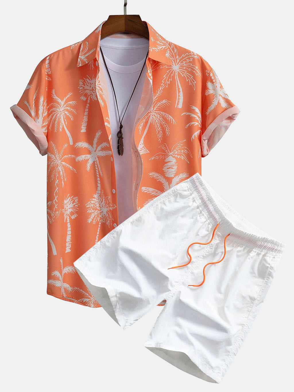 Camisa abotonada con estampado de palmeras y bañador corto