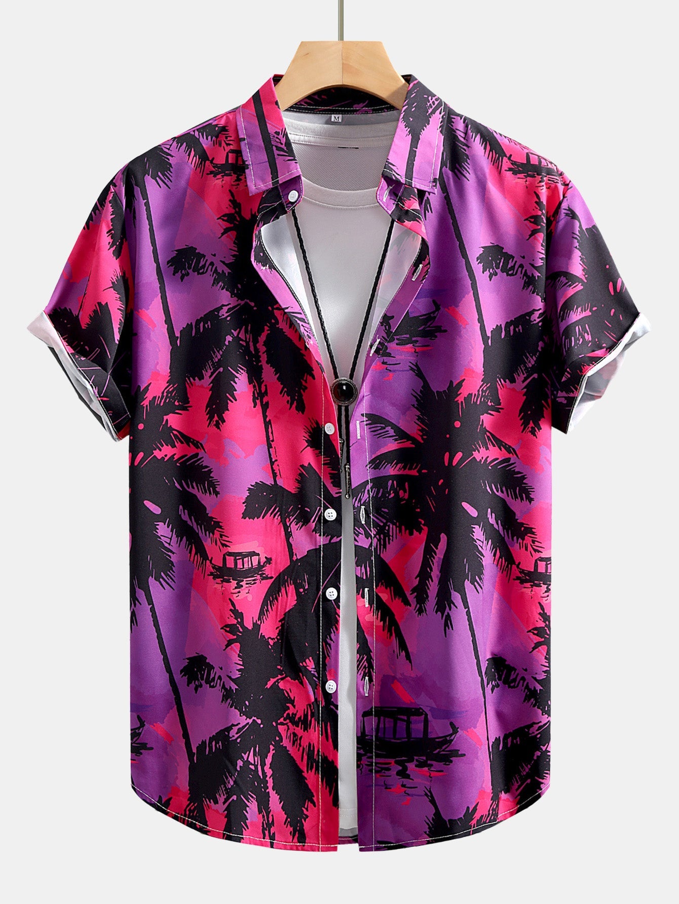 Camisa abotonada con estampado de palmeras y bañador corto