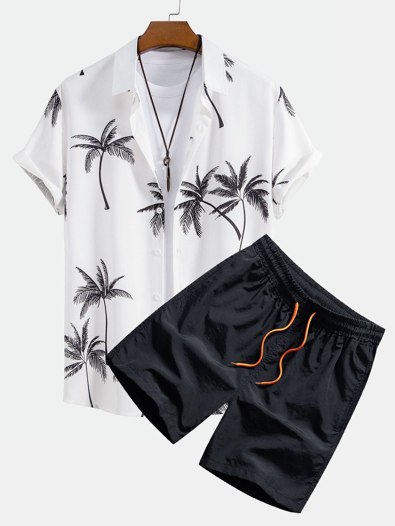 Camisa abotonada con estampado de palmeras y bañador corto