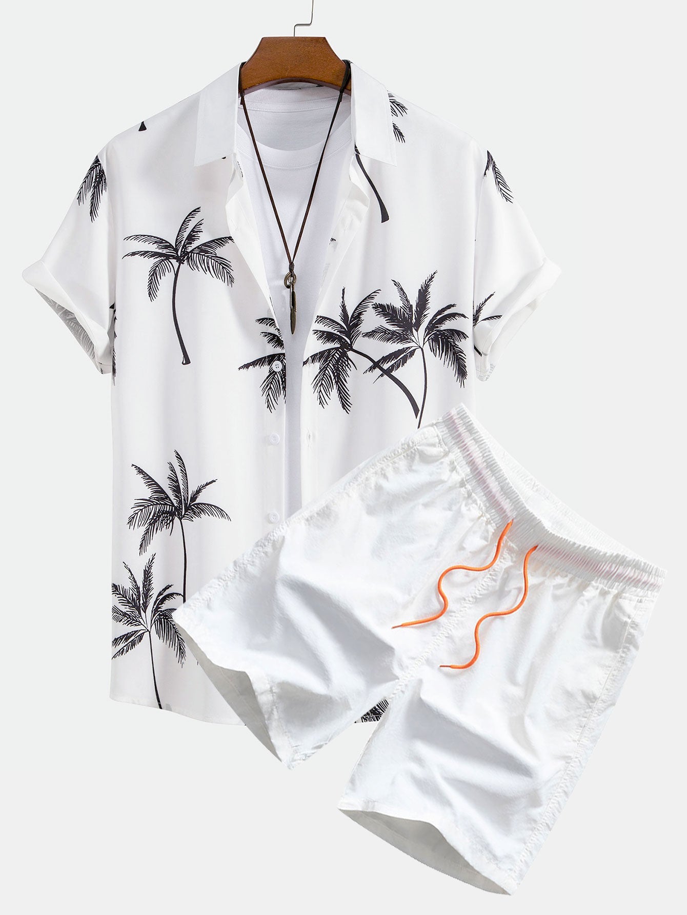 Camisa abotonada con estampado de palmeras y bañador corto