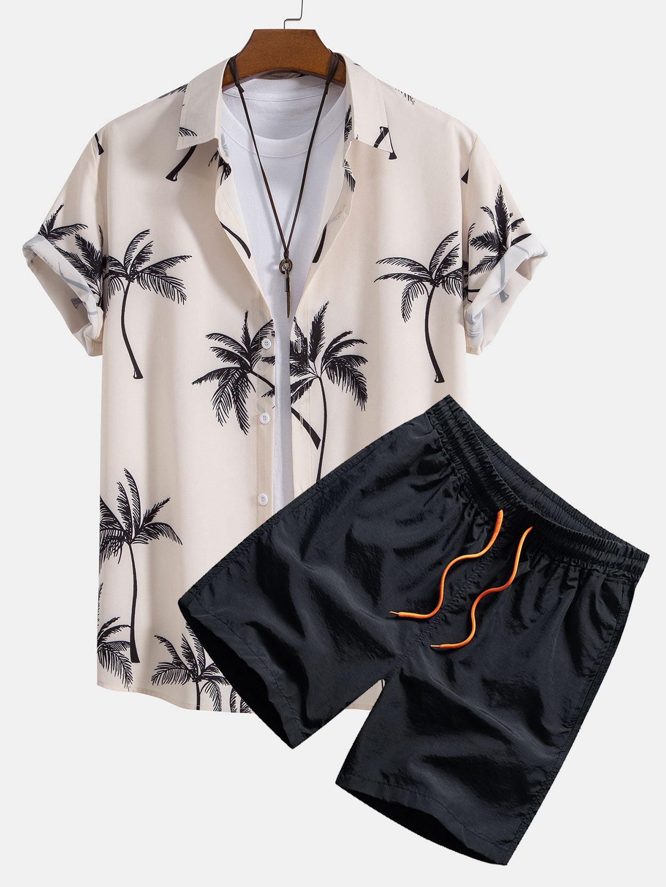 Camisa abotonada con estampado de palmeras y bañador corto