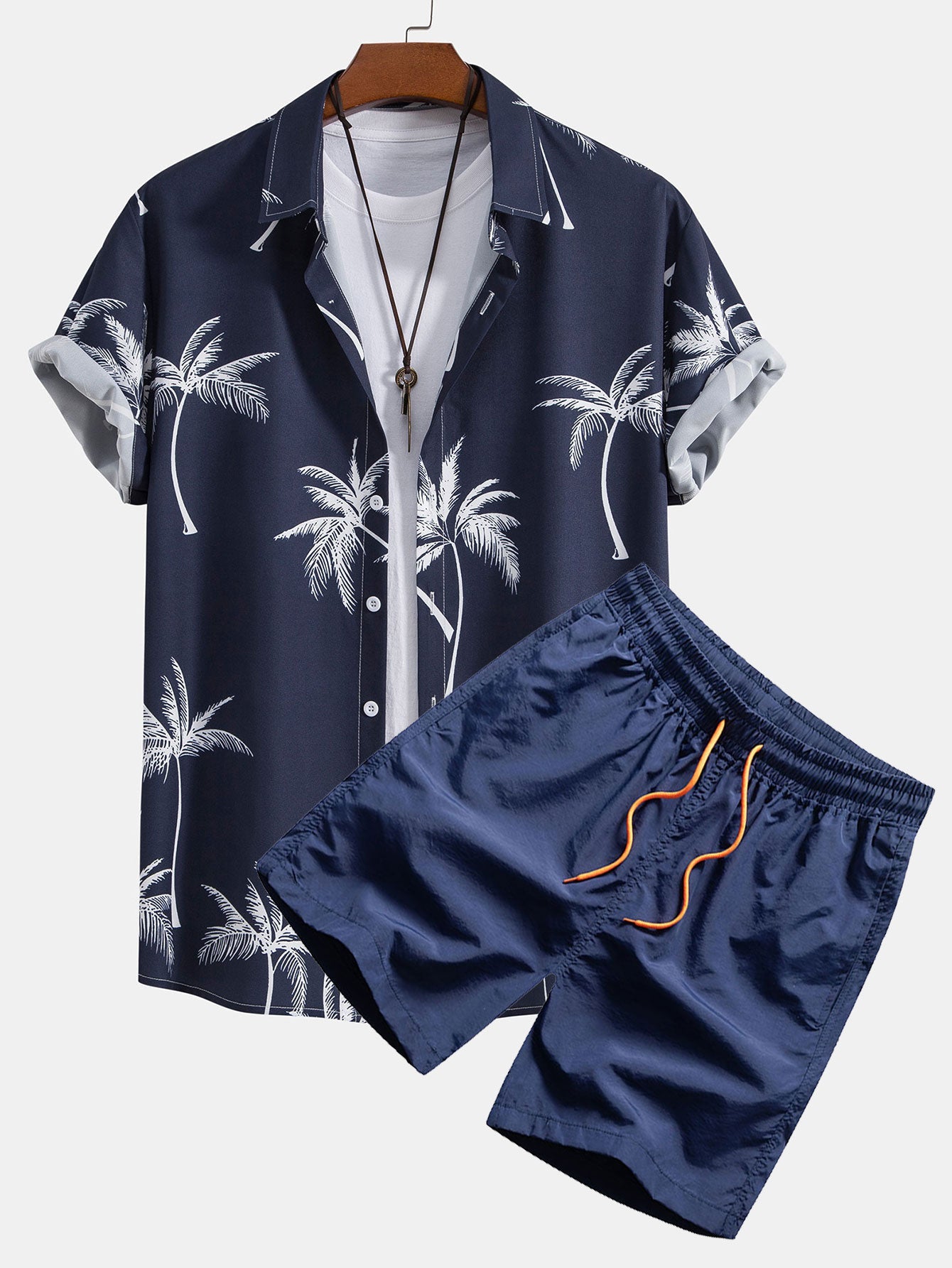 Camisa abotonada con estampado de palmeras y bañador corto