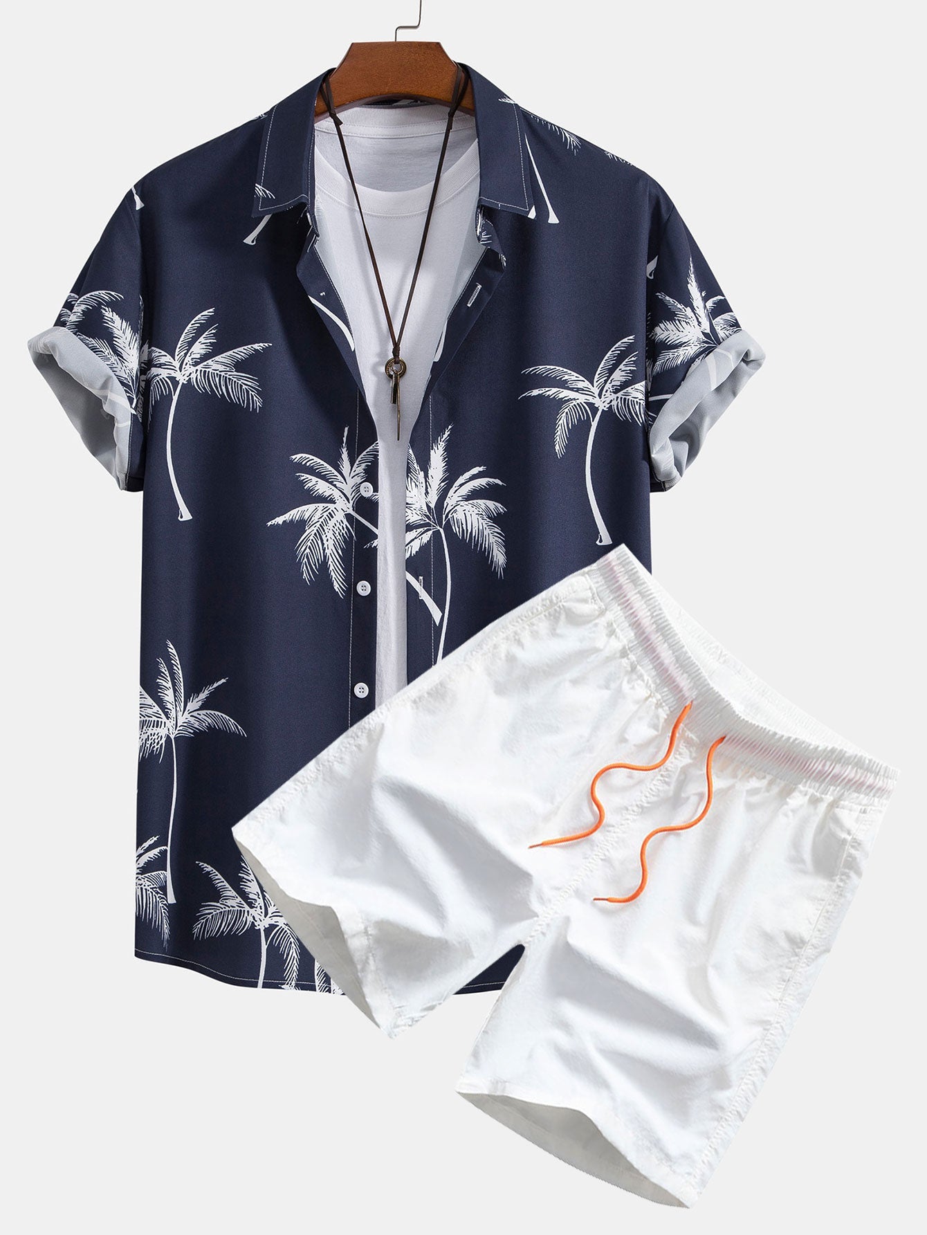 Camisa abotonada con estampado de palmeras y bañador corto