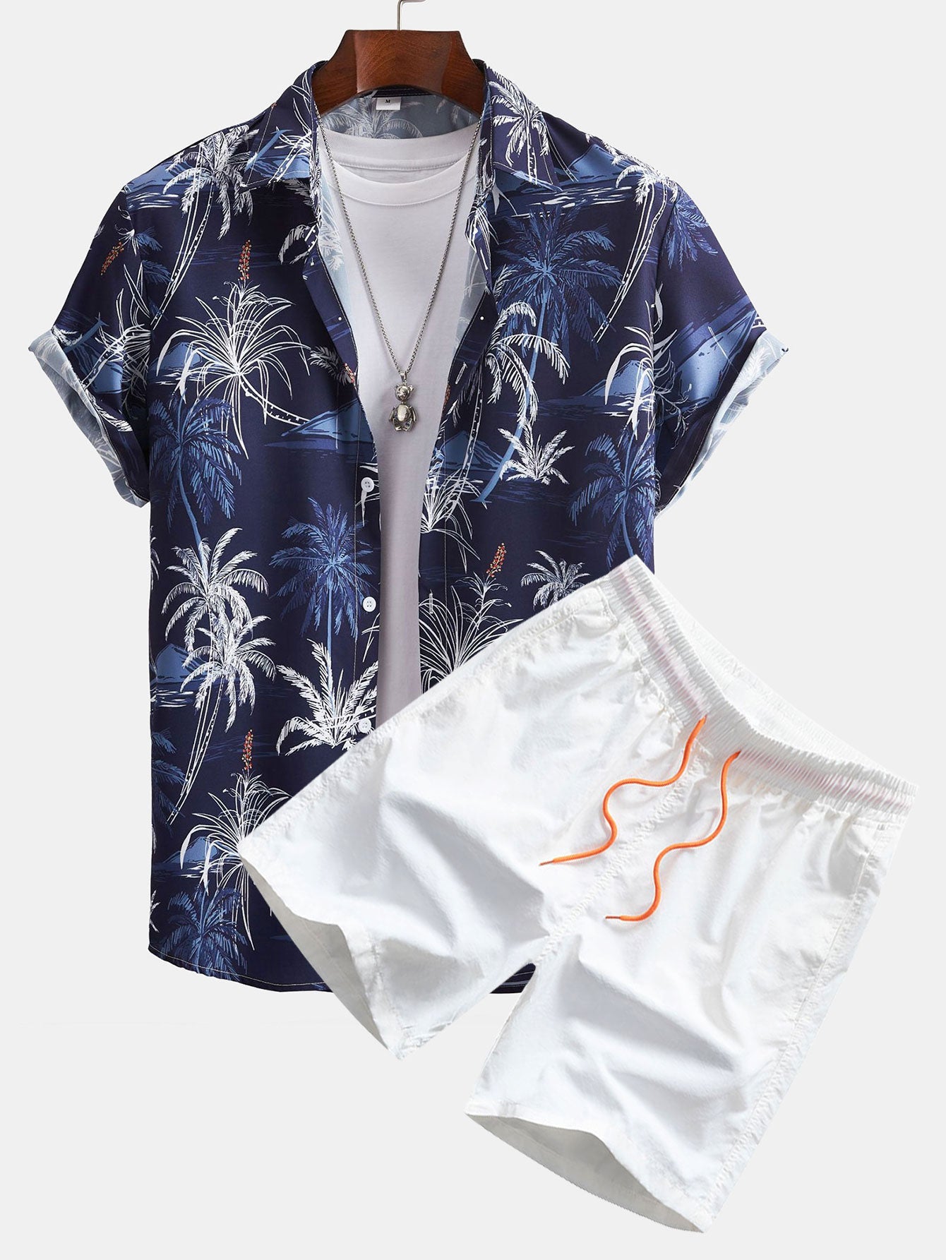 Camisa abotonada con estampado de palmeras y bañador corto