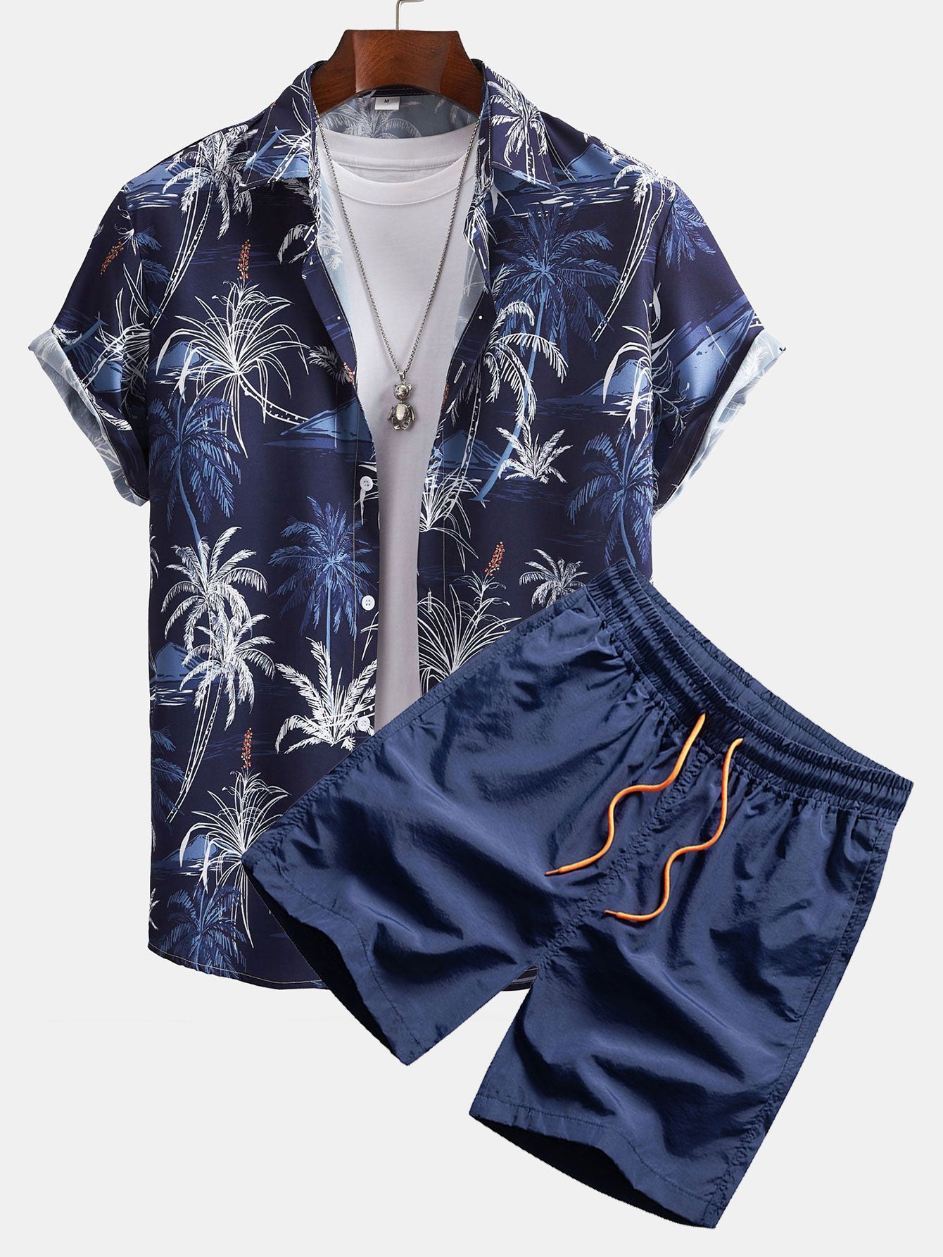 Camisa abotonada con estampado de palmeras y bañador corto