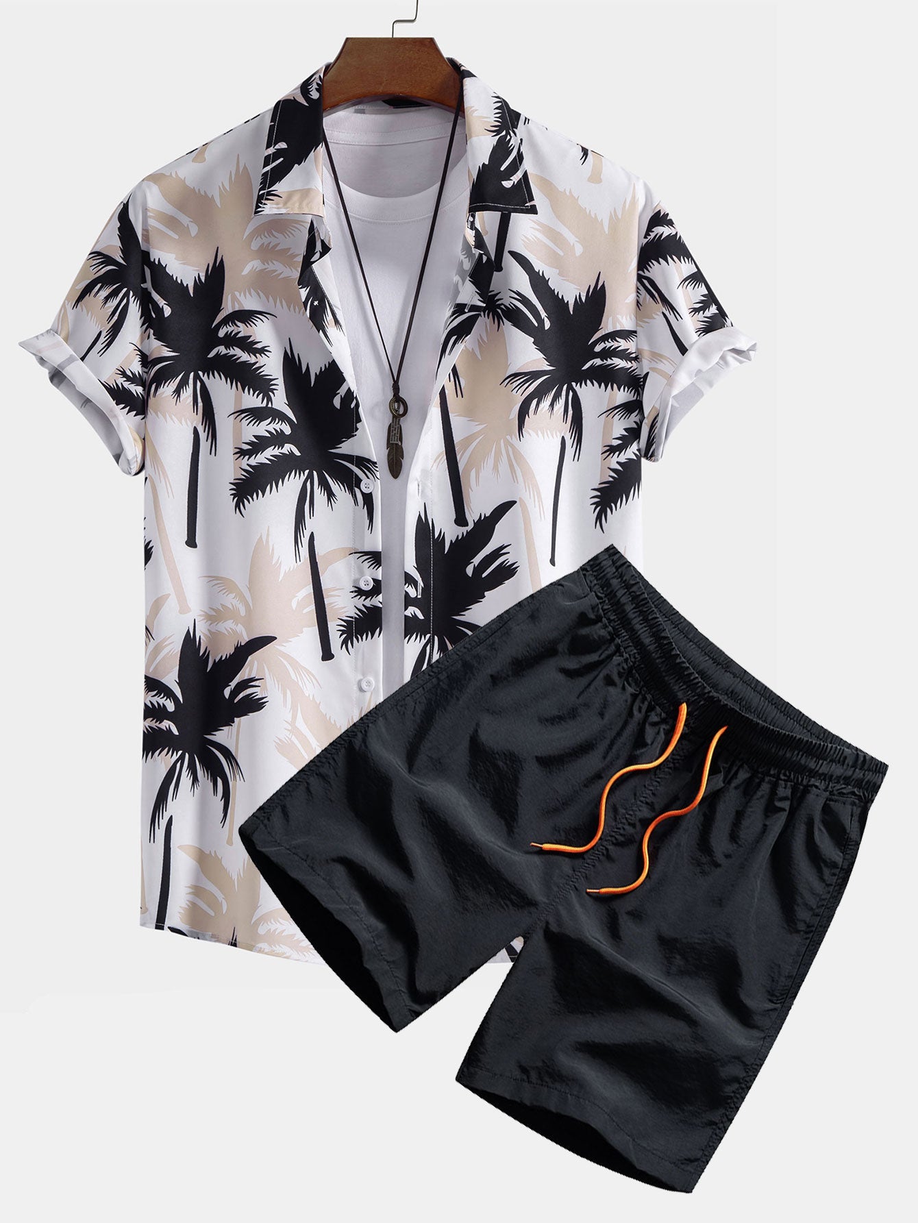 Camisa abotonada con estampado de palmeras y bañador corto