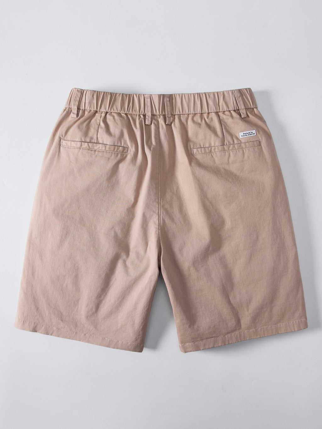 Polo de punto con cremallera texturizada y ribetes en contraste y pantalones cortos chino con cintura elástica