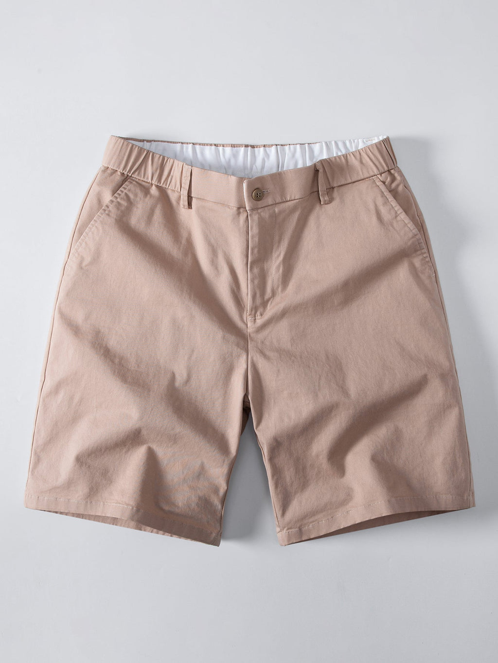 Polo de punto con cremallera texturizada y ribetes en contraste y pantalones cortos chino con cintura elástica