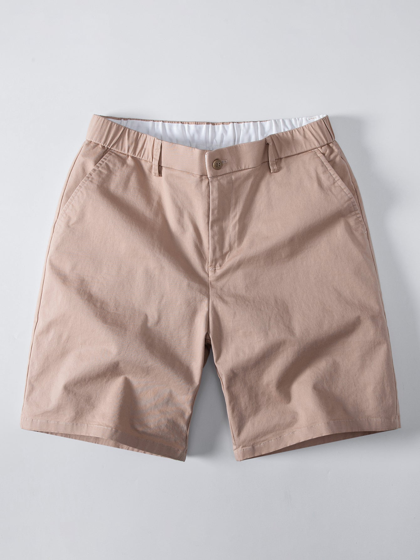 Polo de punto con cremallera texturizada y ribetes en contraste y pantalones cortos chino con cintura elástica