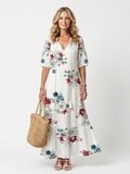 Maeva | Vestido Midi Floral Disperso con Lazos de Borlas