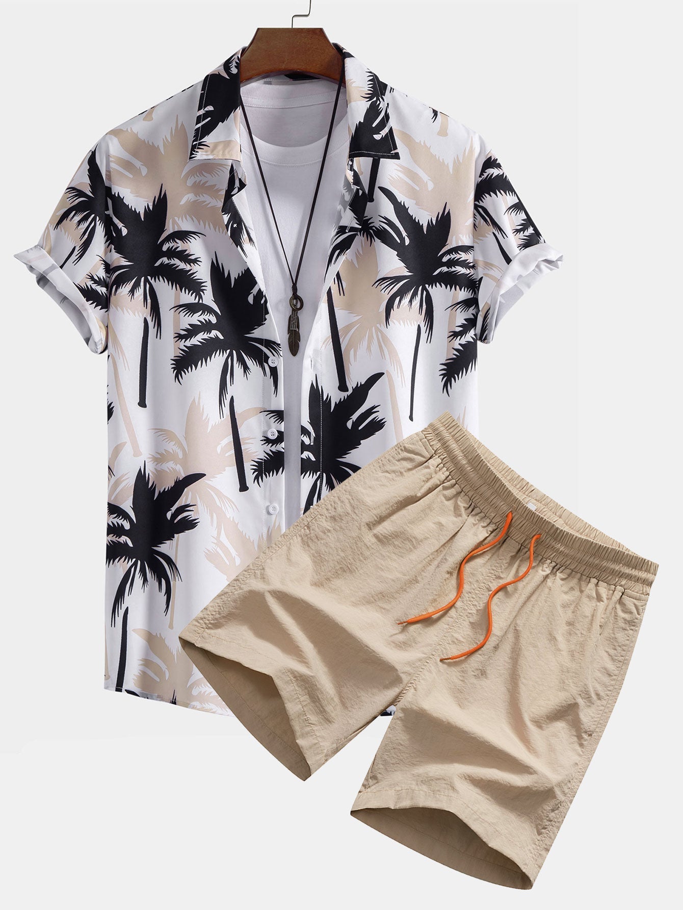 Camisa abotonada con estampado de palmeras y bañador corto