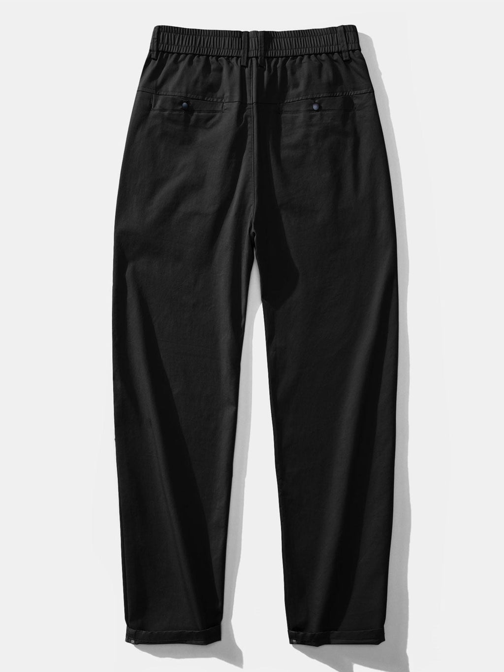 Polo de punto con cremallera texturizada y ribetes en contraste, y pantalones de corte recto con cintura elástica