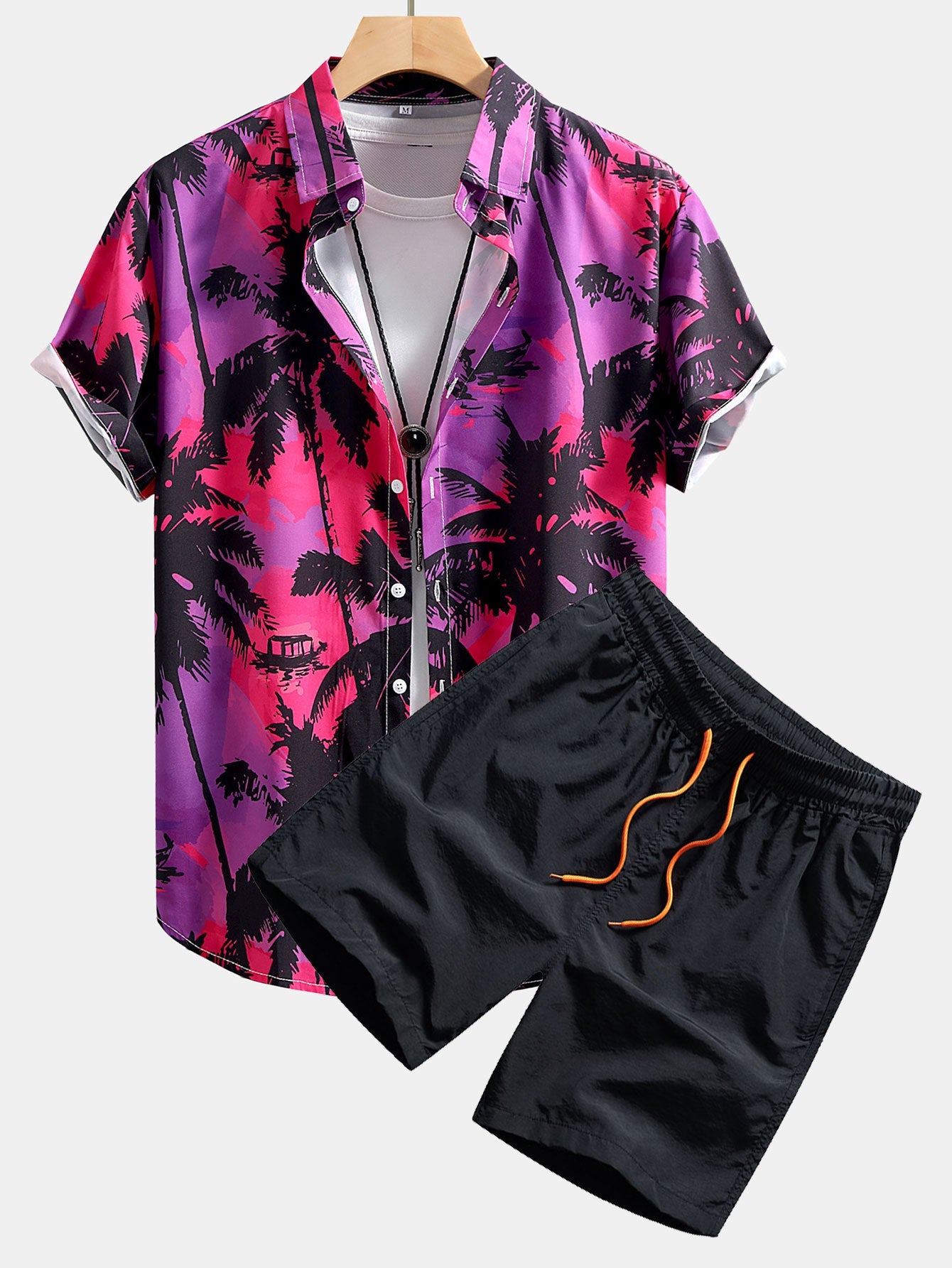 Camisa abotonada con estampado de palmeras y bañador corto
