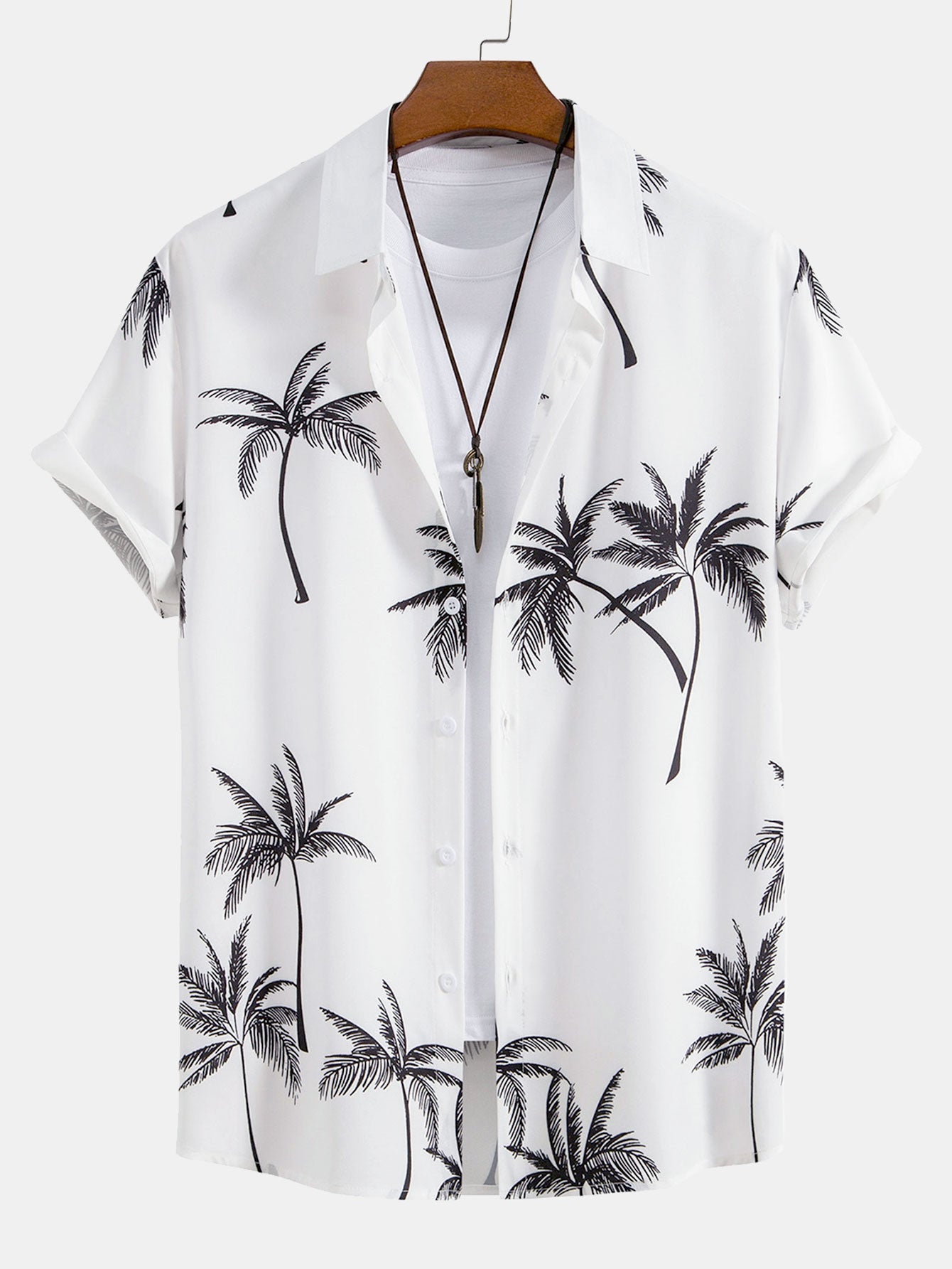 Camisa abotonada con estampado de palmeras y bañador corto