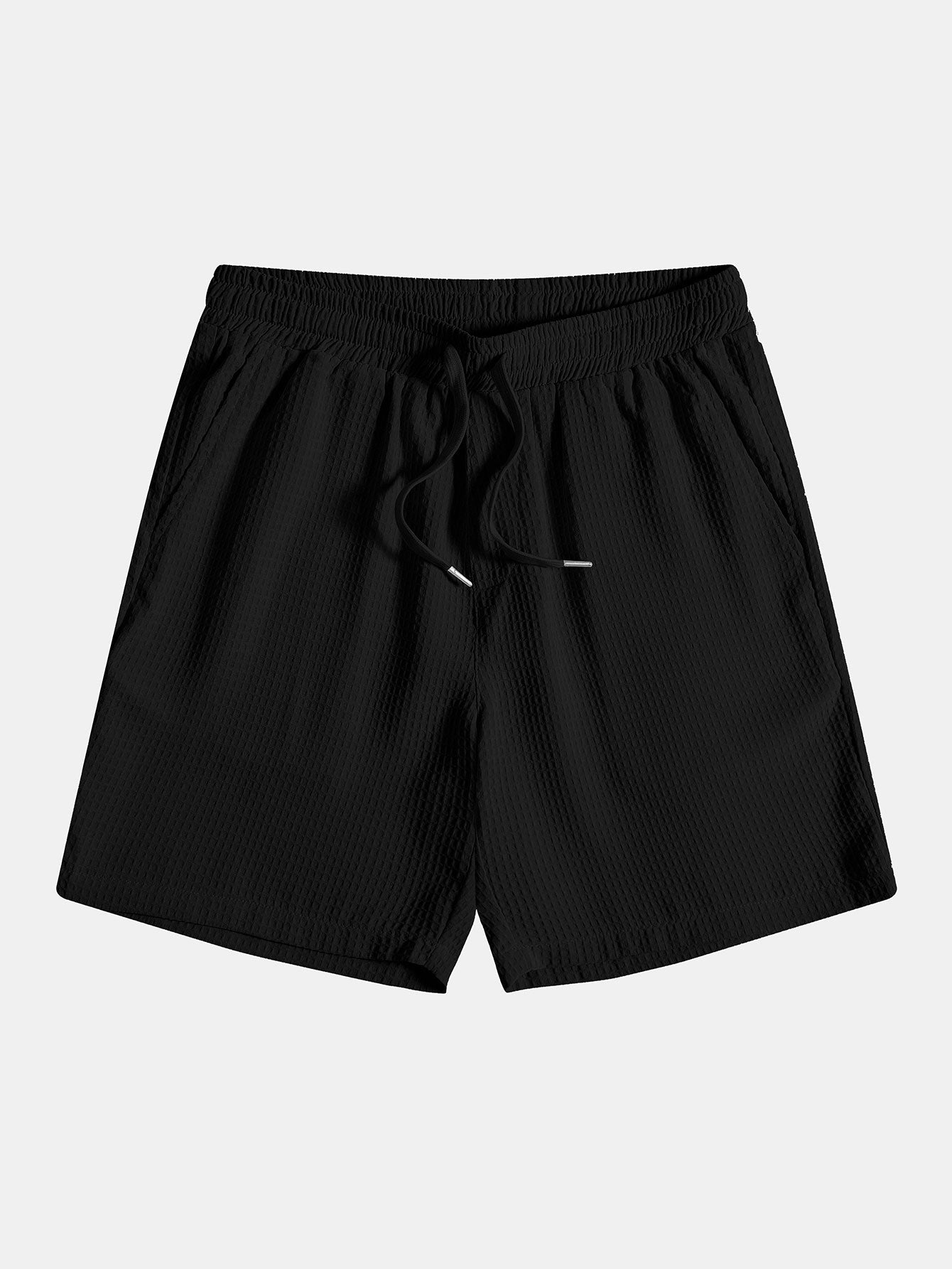 Polo de punto con tejido tipo gofre y pantalones cortos con cordón de ajuste y tejido tipo gofre