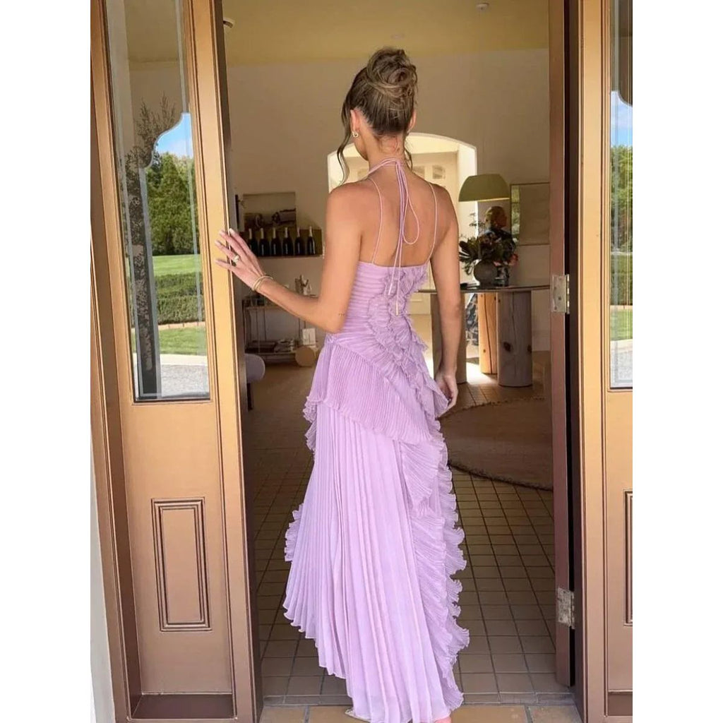 Vestido plisado con detalle de volantes