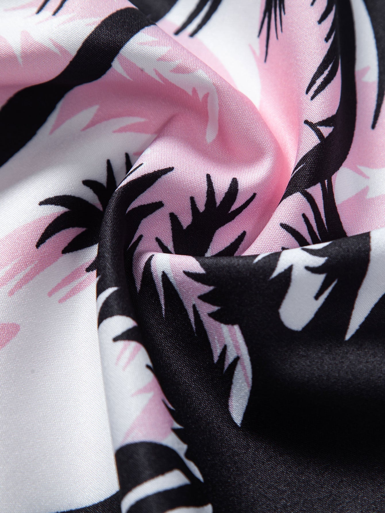 Camisa abotonada con estampado de palmeras y bañador corto
