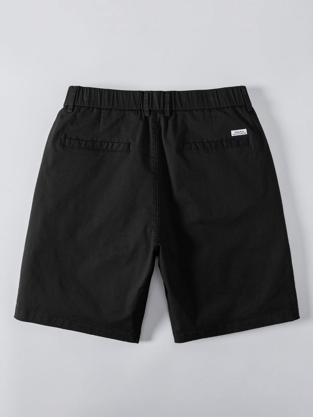 Polo de punto con cremallera texturizada y ribetes en contraste y pantalones cortos chino con cintura elástica
