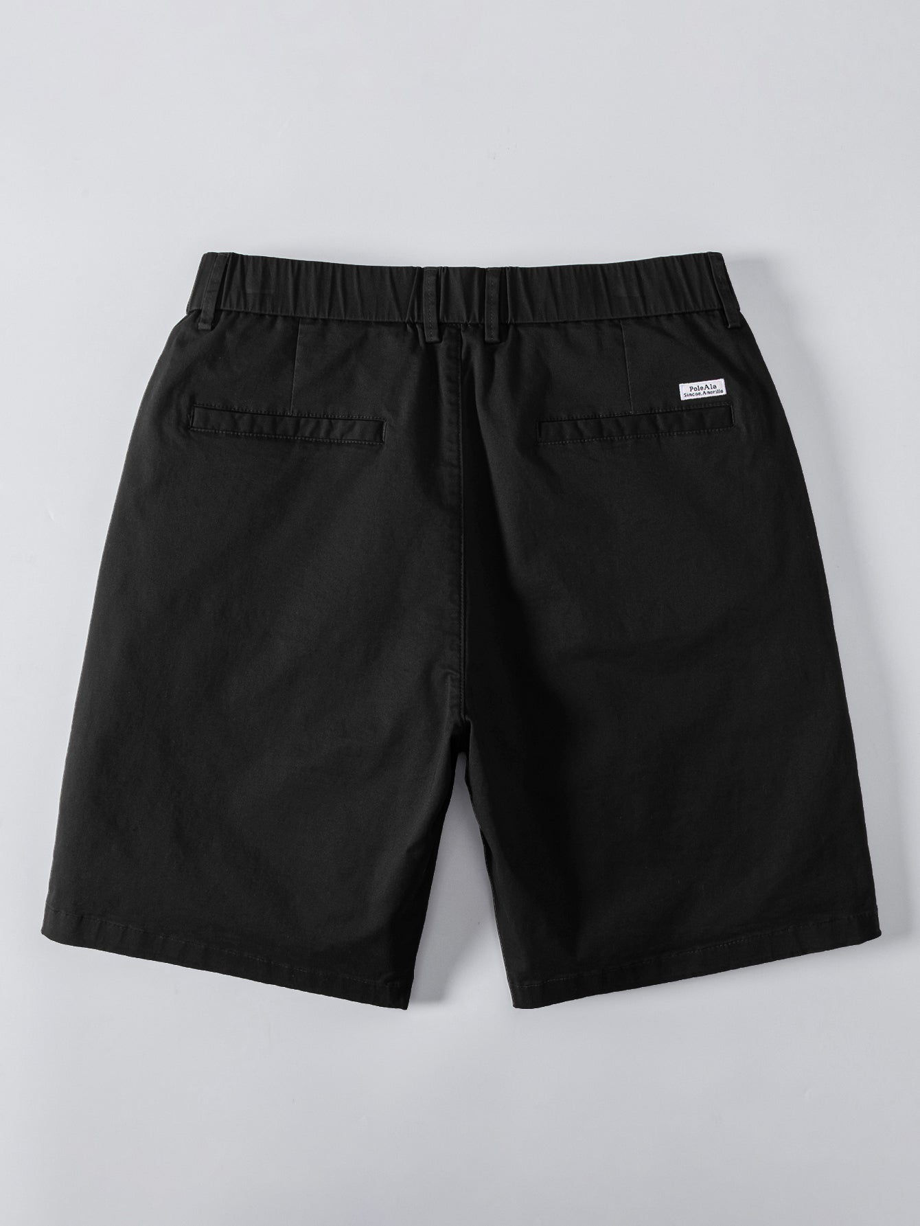 Polo de punto con cremallera texturizada y ribetes en contraste y pantalones cortos chino con cintura elástica