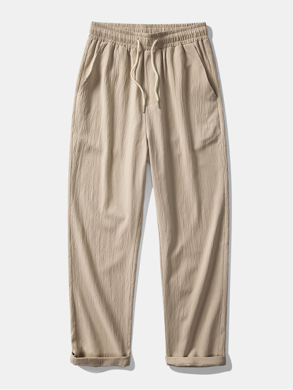 Camisa de botones con estampado jacquard geométrico y pantalones rectos con textura arrugada