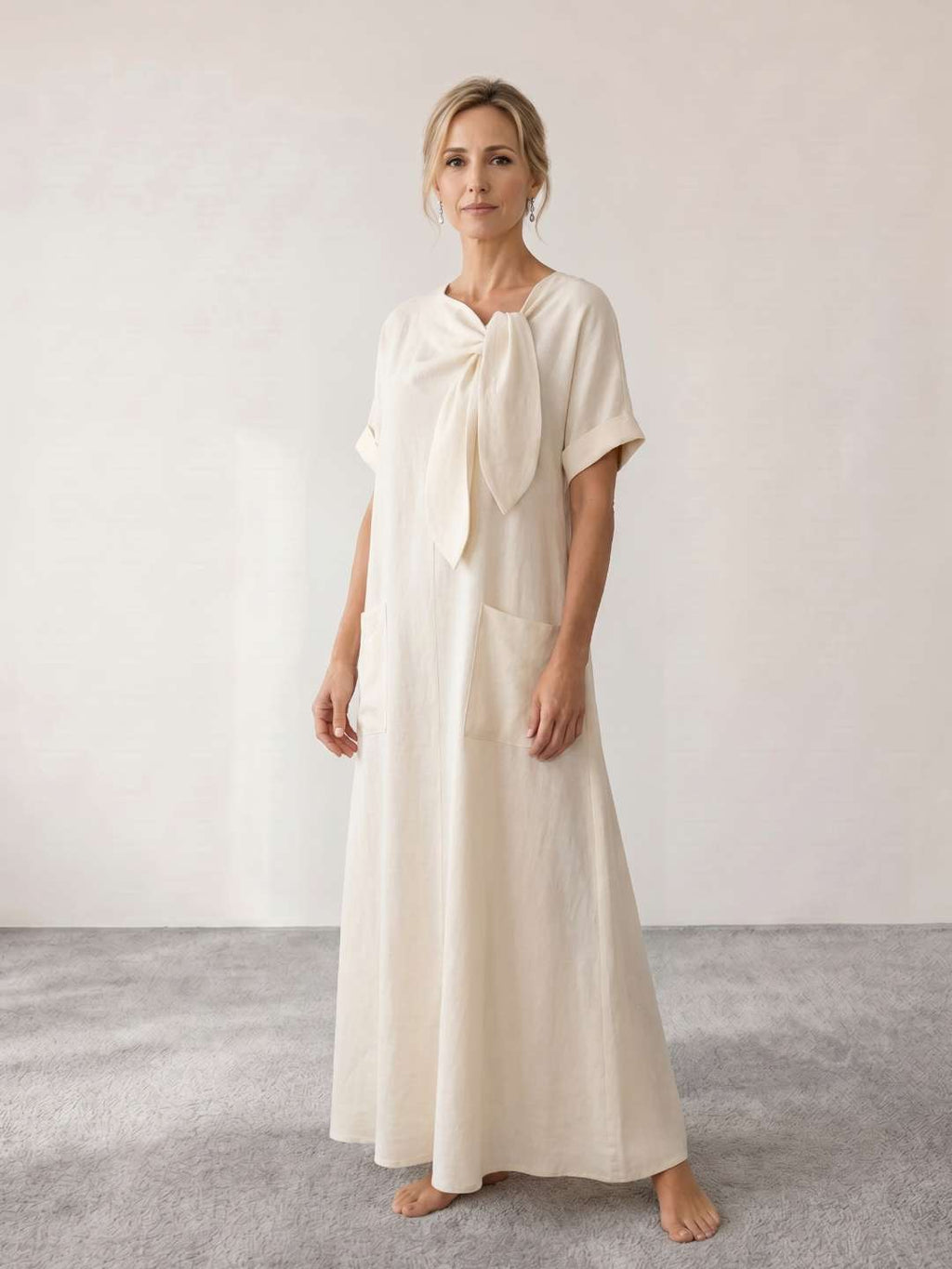 Vestido midi fluido con lazada al cuello