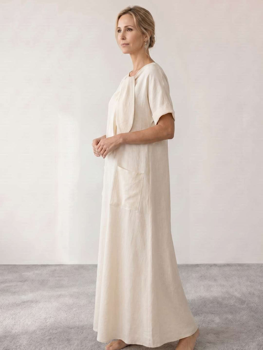 Vestido midi fluido con lazada al cuello
