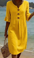 Vestido Boho Cuello V de Lino y Algodón con Botones Grandes – Colección Primavera-Verano 2026