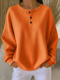 Clara | Camiseta henley de punto gofre, acogedora