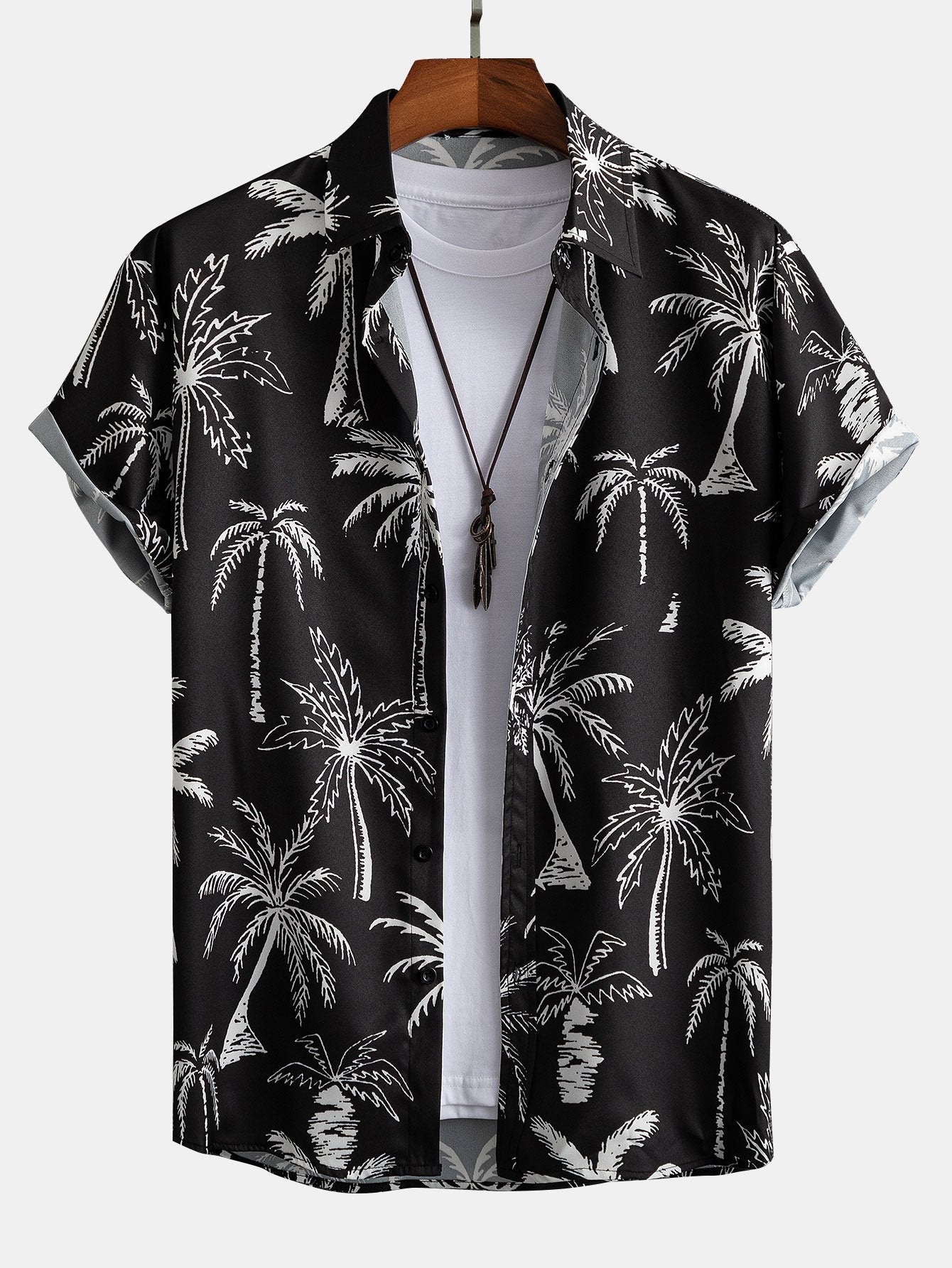 Camisa abotonada con estampado de palmeras y bañador corto