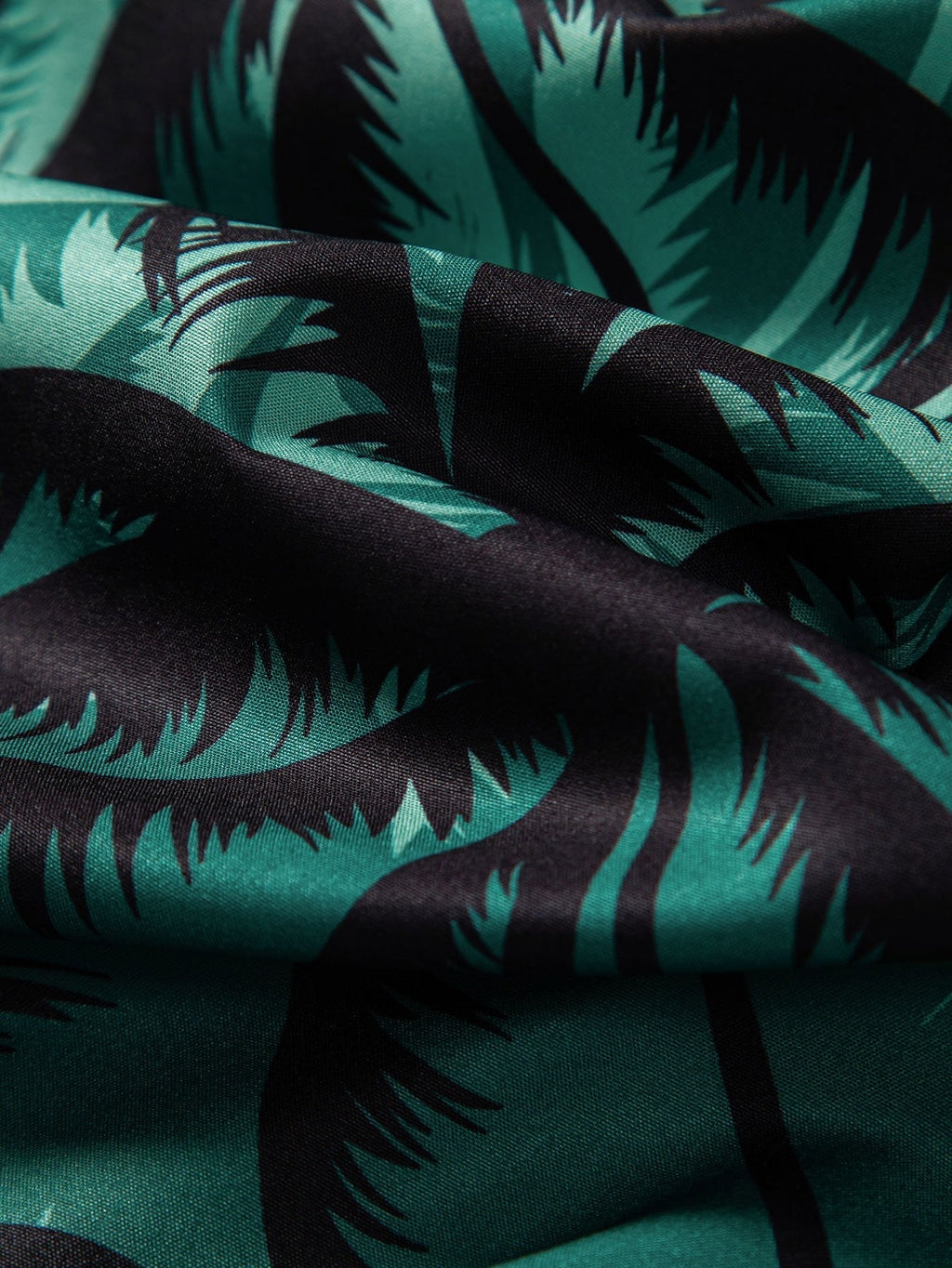 Camisa abotonada con estampado de palmeras y bañador tipo bermuda
