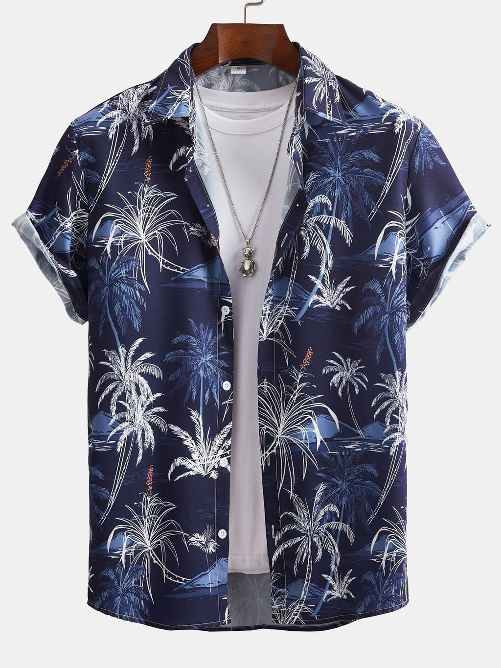 Camisa abotonada con estampado de palmeras y bañador corto