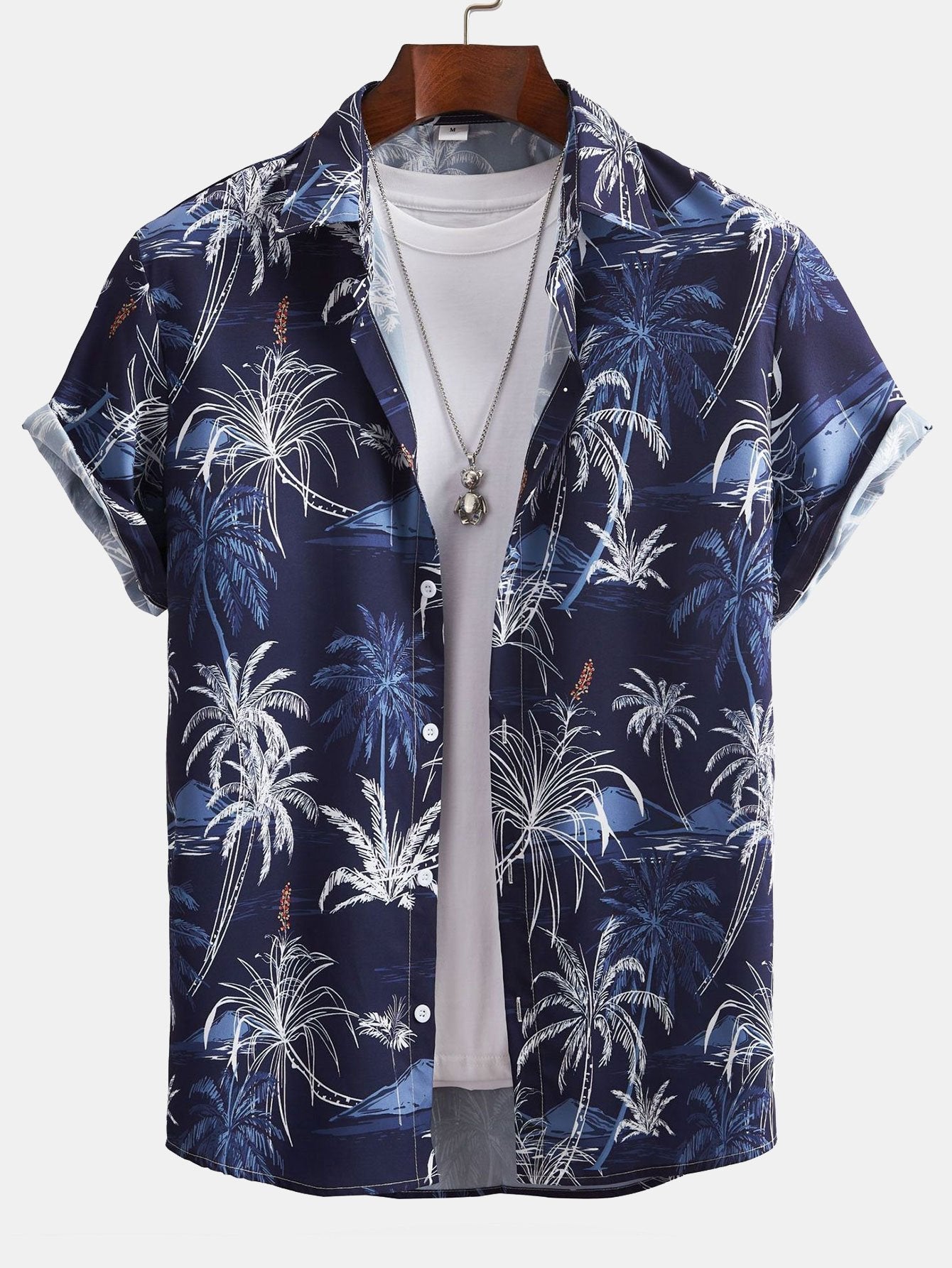 Camisa abotonada con estampado de palmeras y bañador corto