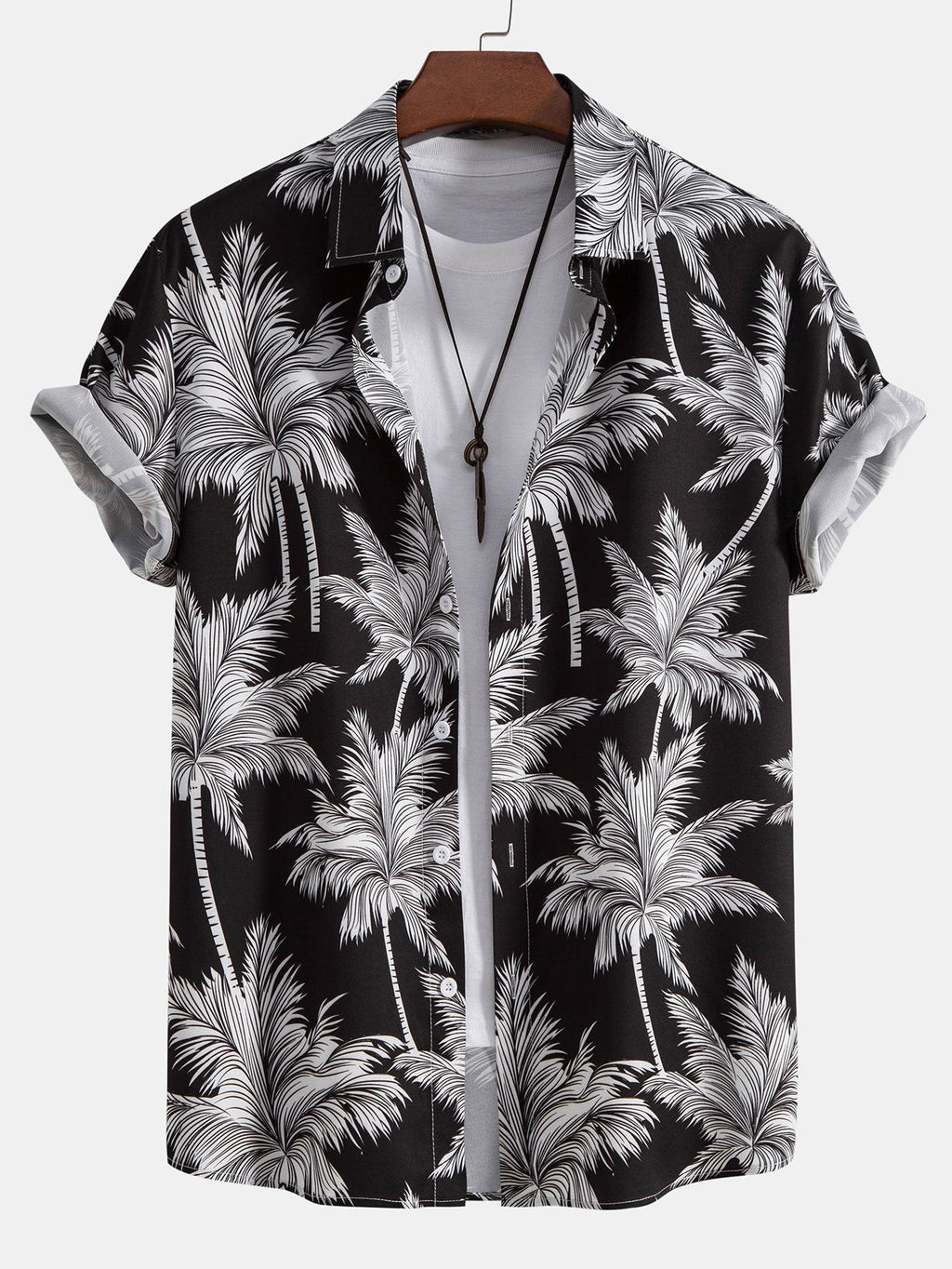 Camisa abotonada con estampado de palmeras y bañador corto