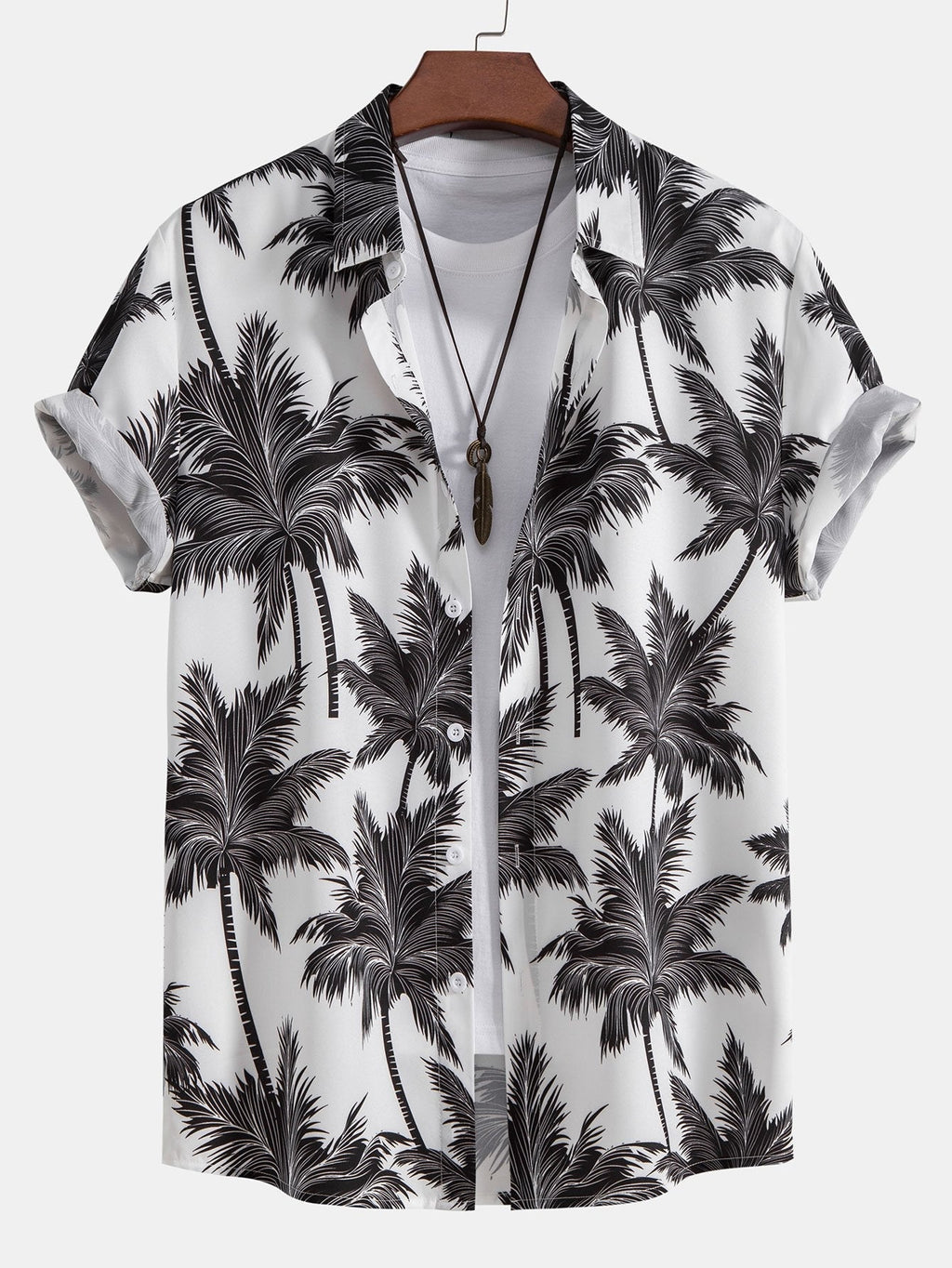 Camisa abotonada con estampado de palmeras y bañador corto
