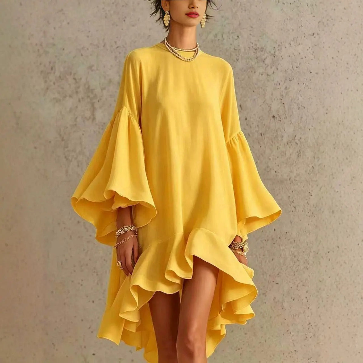 Amelia Vestido Elegante con Volantes y Bajo Asimétrico
