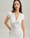 Blusa Blanca Texturizado Manga Corta Abullonada